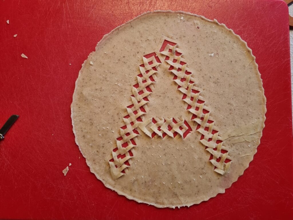 Útskorið laufabrauð, með stafnum A.